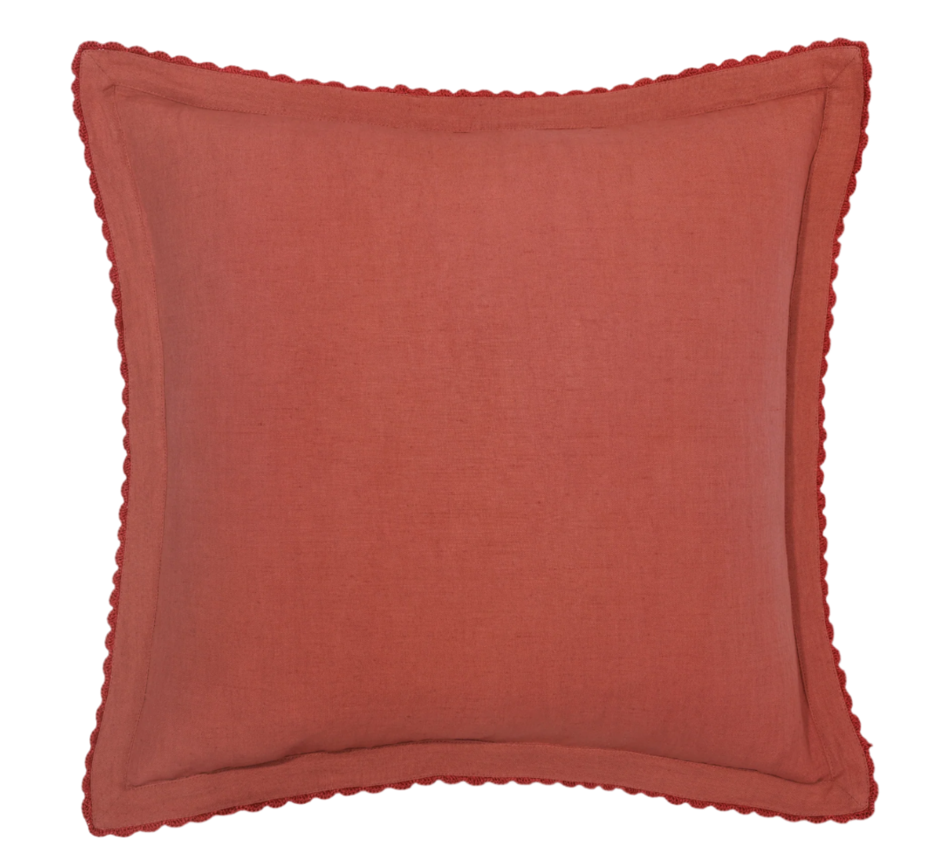 persimmon pillow photographed on white background