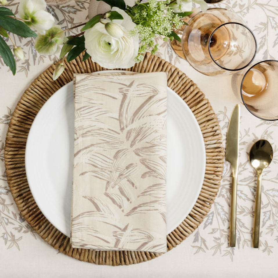 place setting with sylvan cream napkin