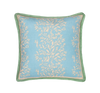 primrose azul pillow with contrasting green trim photographed against a white background