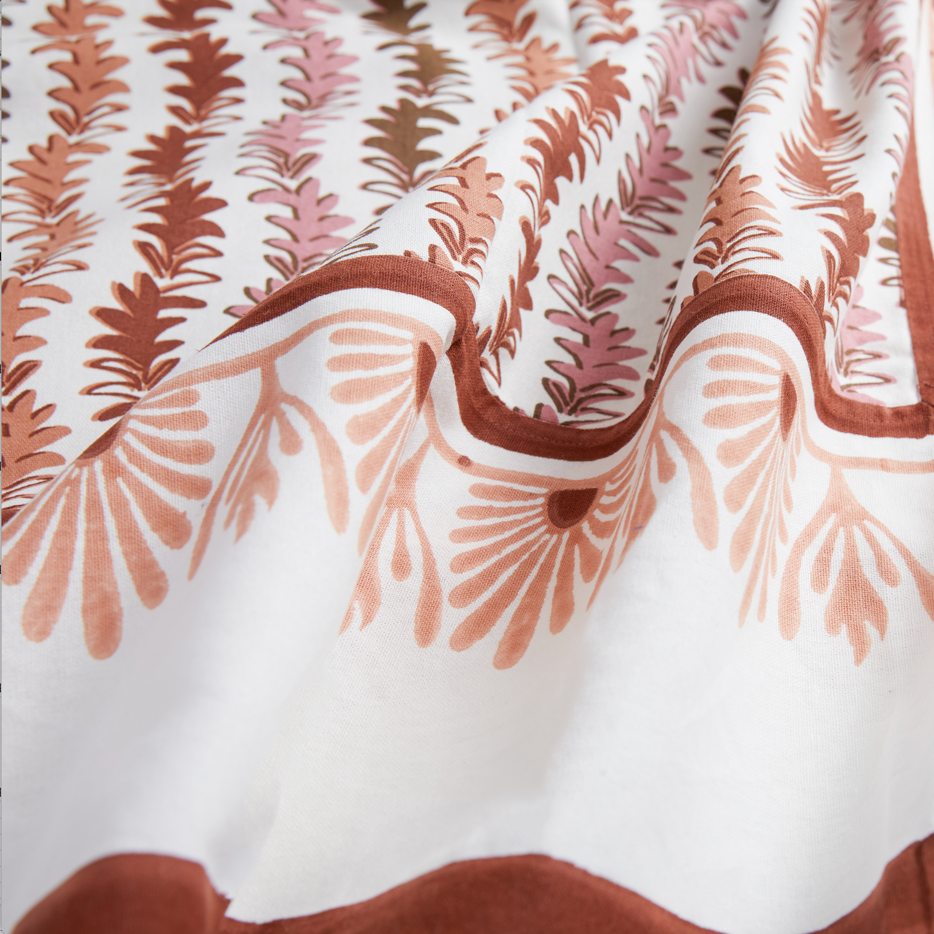 close up of teracotta tablecloth