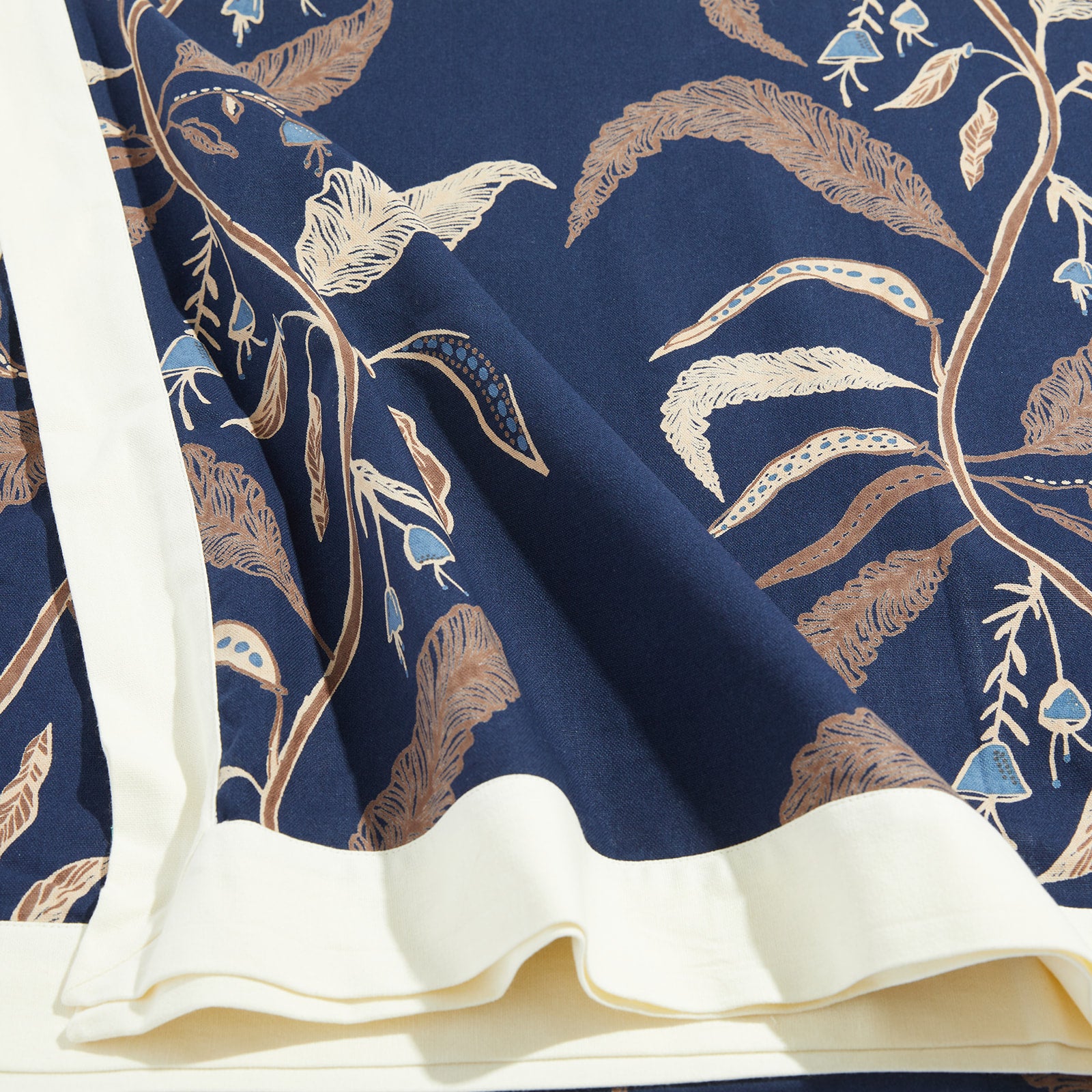 close up of tuileries woodsy tablecloth