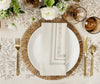 place setting with a natural napkin on a plate